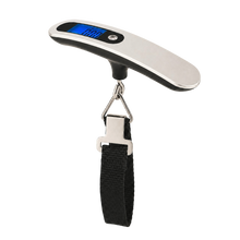 Digital luggage scale with a black strap on a white background